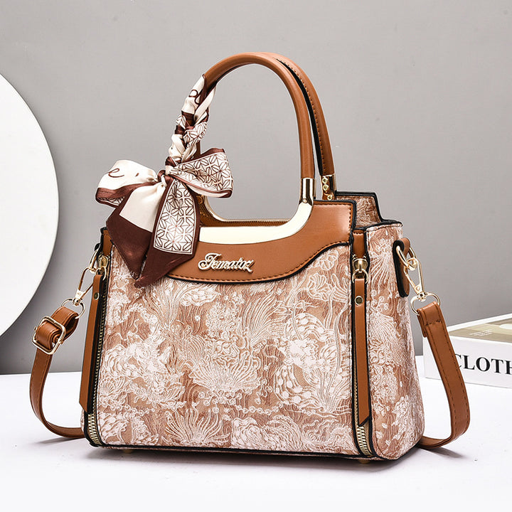 Damen elegante Handtasche mit floralem Design und Schmuckdetails Nord Taschen