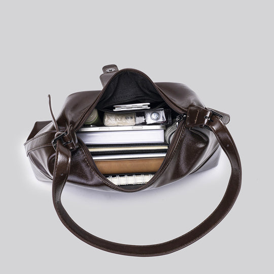 Damen modische Schultertasche mit strukturiertem Leder und zeitgemäßem Schnallenakzent Nord Taschen