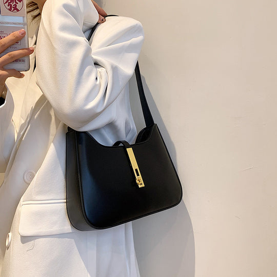 Damen Umhängetasche mit goldenen Akzenten und hochwertiger Oberfläche Nord Taschen