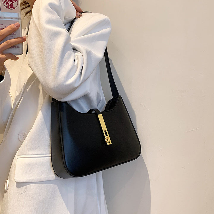 Damen Umhängetasche mit goldenen Akzenten und hochwertiger Oberfläche Nord Taschen