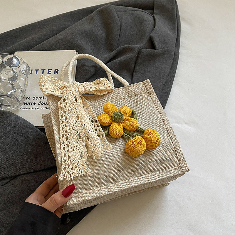 Damen Tragetasche mit floralem Häkelmuster und verspieltem Dekoband Nord Taschen