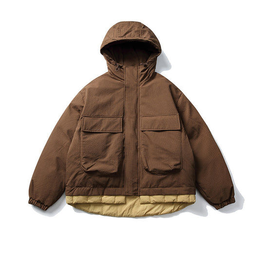 Unisex Kurz geschnittene wattierte Kapuzenjacke im Materialmix mit aufgesetzten Taschen Nord Taschen