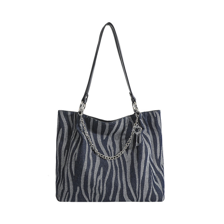 Damen Tote-Tasche mit stylischem Zebra-Muster und elegantem Kettenakzent Nord Taschen