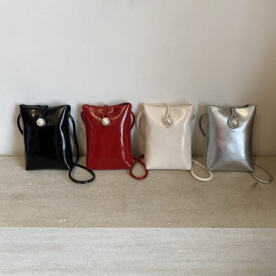Damen elegante Handtasche mit perlenverziertem Verschluss Nord Taschen
