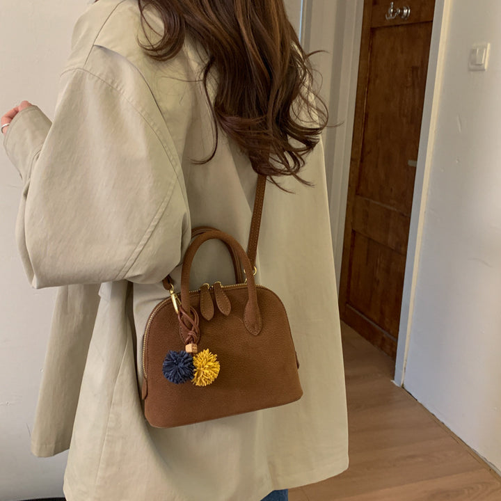 Damen Handtasche mit eleganten Quasten Nord Taschen