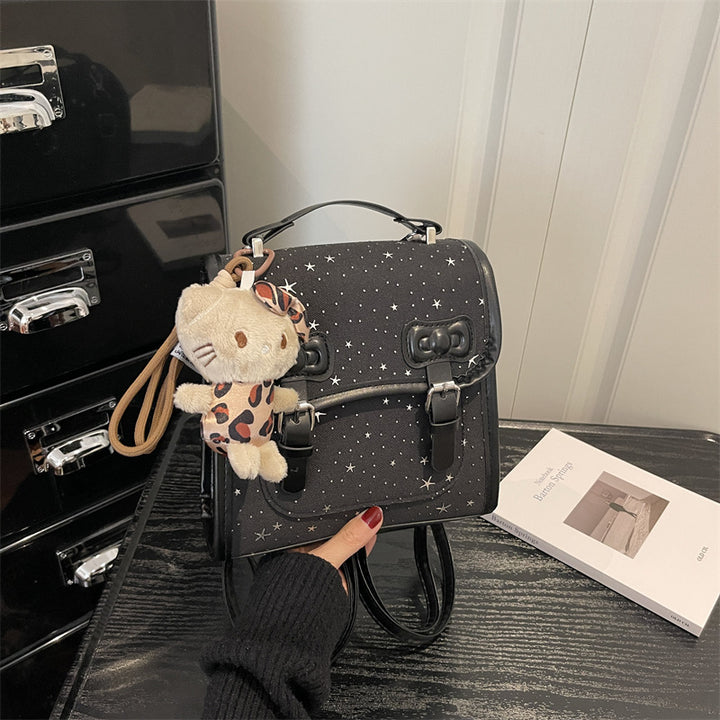 Damen Rucksackhandtasche mit niedlichem Tieranhänger und glänzender Oberfläche Nord Taschen