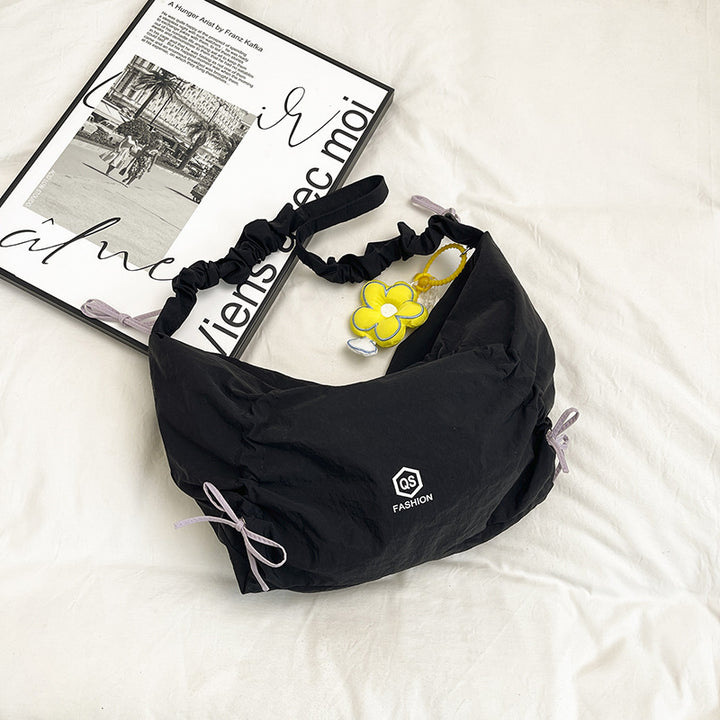 Damen lässige Beuteltasche mit verstellbarem Tragegurt und buntem Blumendetail Nord Taschen