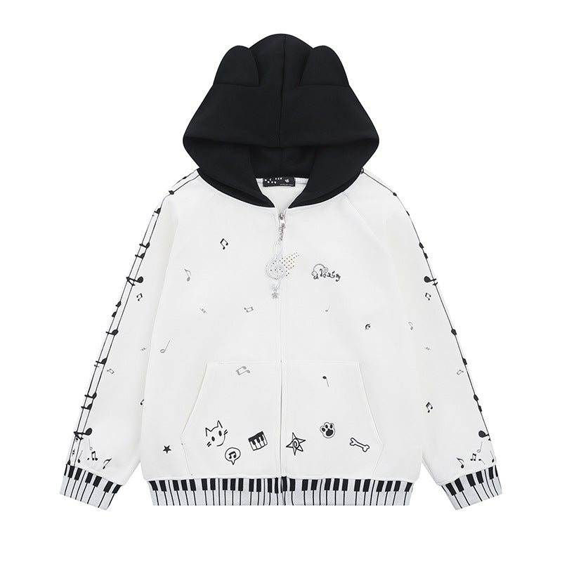 Damen Kapuzensweatjacke mit durchgehendem Reißverschluss, Musikprint, Klaviertasten‑Bündchen und Ohrenkapuze Nord Taschen
