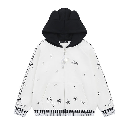 Damen Kapuzensweatjacke mit durchgehendem Reißverschluss, Musikprint, Klaviertasten‑Bündchen und Ohrenkapuze Nord Taschen