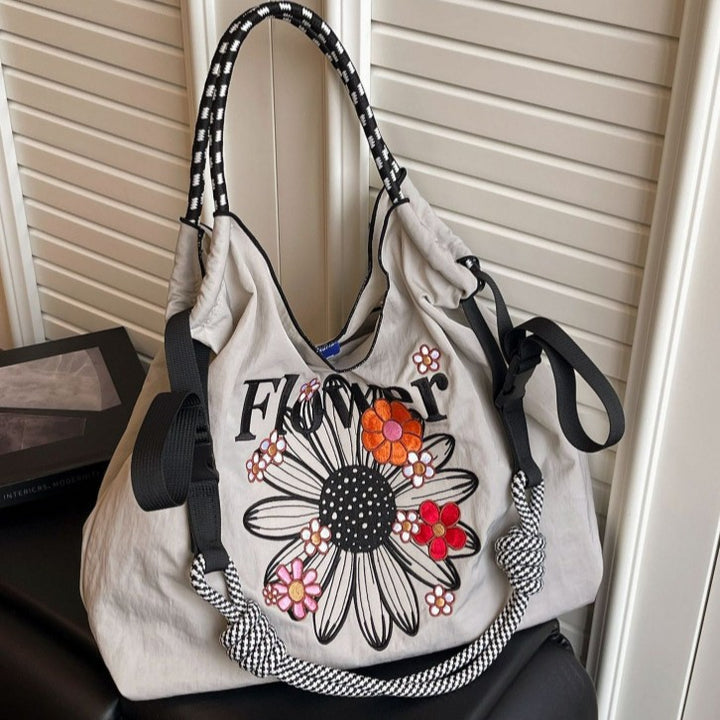 Damen Umhängetasche mit floralem Design und praktischem Zugverschluss Nord Taschen
