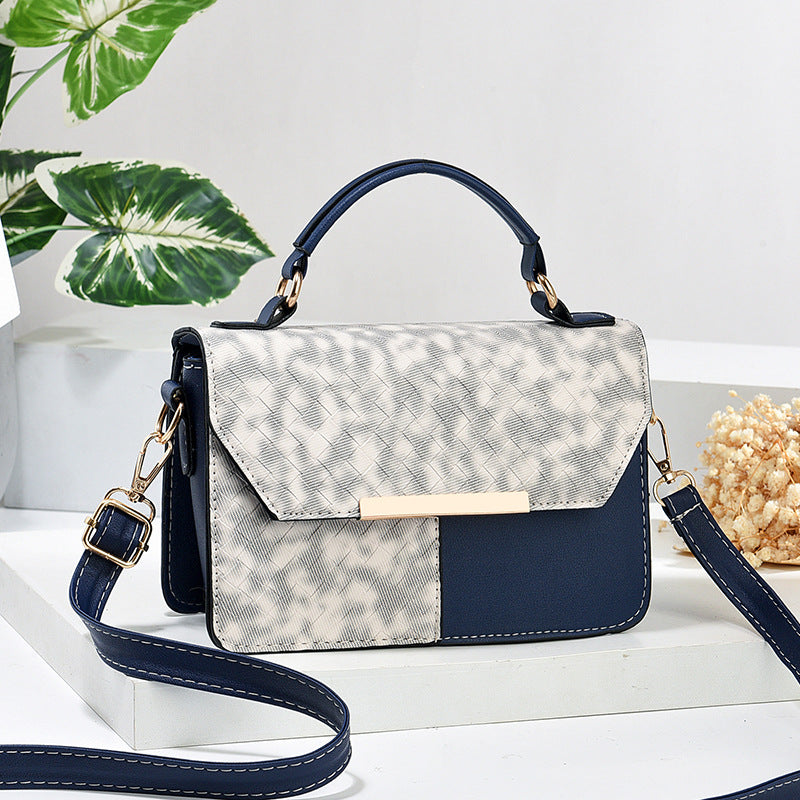 Damen modische Umhängetasche mit strukturiertem Design und goldenen Akzenten Nord Taschen