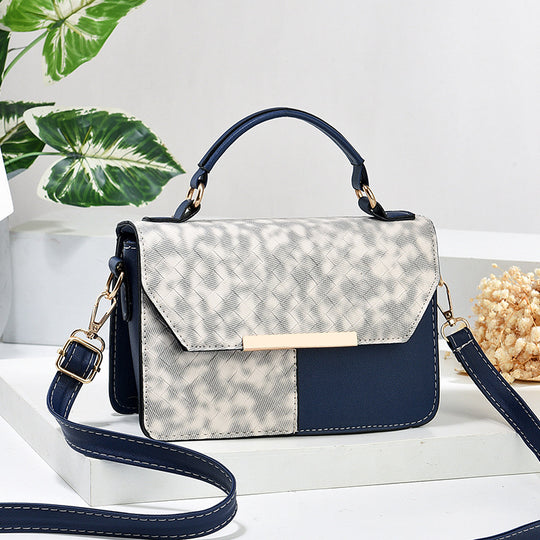 Damen modische Umhängetasche mit strukturiertem Design und goldenen Akzenten Nord Taschen