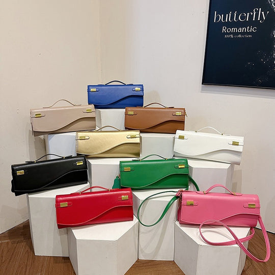 Damen Clutch-Handtasche mit elegantem Wellenmuster und praktischen Fächern Nord Taschen