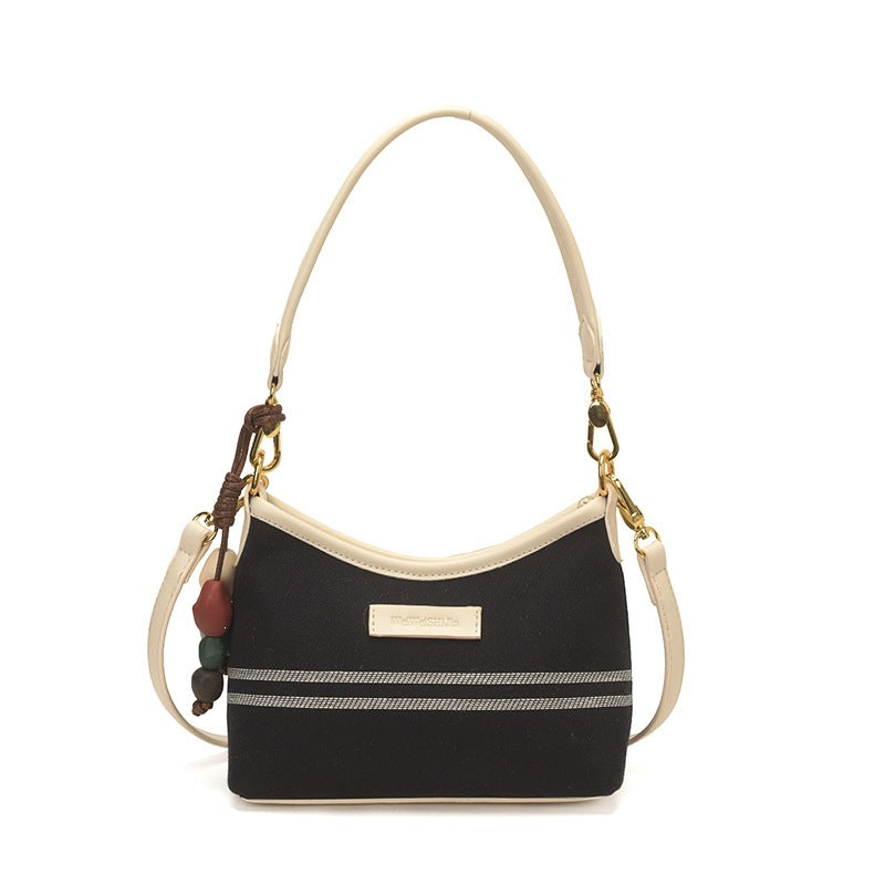 Damen Hobo-Tasche aus strapazierfähigem Material mit dekorativer Quaste Nord Taschen