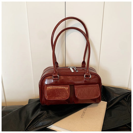Damenhandtasche mit praktischen aufgesetzten Taschen Nord Taschen