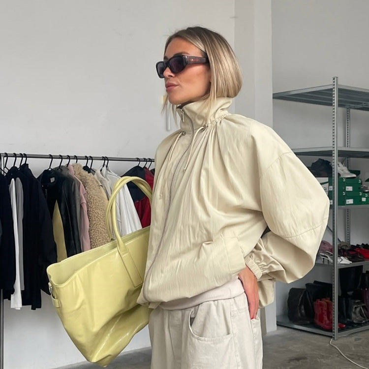 Damen Oversize Windjacke mit hohem Stehkragen, Tunnelzug-Schulterpasse und Ballonärmeln Nord Taschen