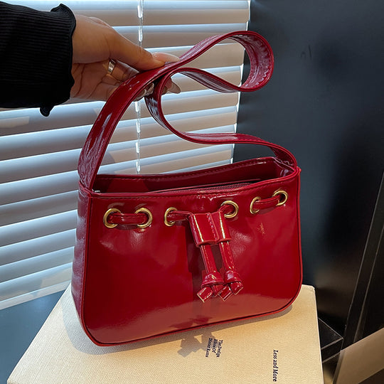 Damen praktische Umhängetasche mit glänzendem Effekt und elegantem Knotenakzent Nord Taschen