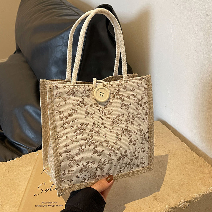 Damen Handtasche mit floralem Design und robusten Griffen Nord Taschen