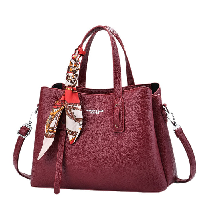 Damen elegante Handtasche mit dekorativem Schal Nord Taschen