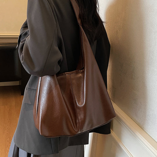 Damen Hobo-Tasche aus weichem Kunstleder mit praktischem Innenteil Nord Taschen