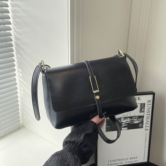 Damen elegante Umhängetasche aus hochwertigem Kunstleder mit zuverlässigem Klappverschluss Nord Taschen