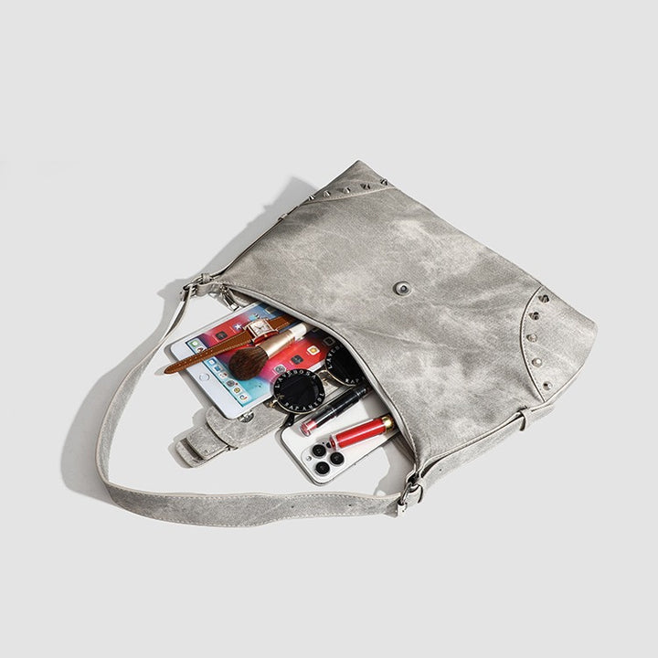 Damen modische Hobo-Tasche mit dekorativen Schnallen und hochwertigen Details Nord Taschen