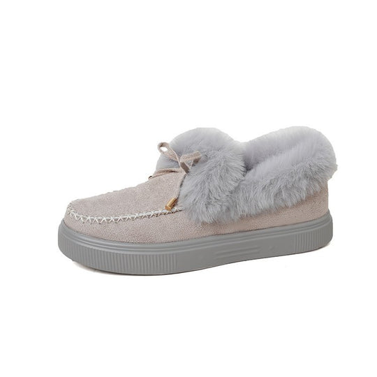 Damen Kuschel‑Mokassin‑Slipper mit hochfloriger Fellmanschette, dekorativer Steppnaht und leichtem Plateau‑Sohlenprofil Nord Taschen