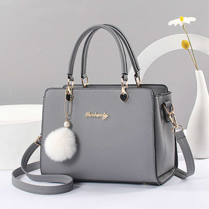 Damen hochwertige Handtasche mit abnehmbarer Quaste Nord Taschen