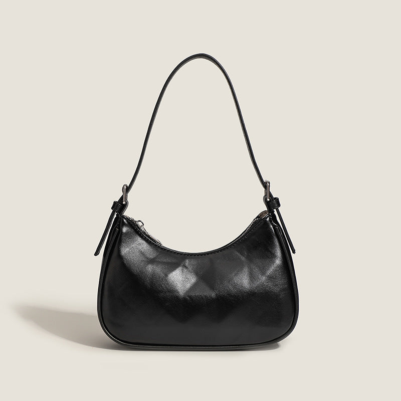 Damen Umhängetasche mit glänzender Oberflächenstruktur und einzigartigem Design Nord Taschen