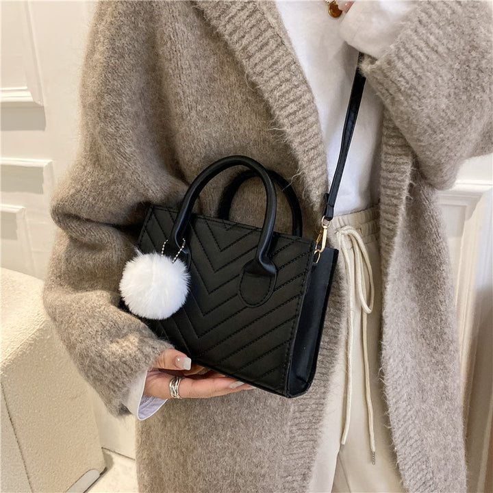 Damen elegante Handtasche im strukturierten Chevron-Design Nord Taschen
