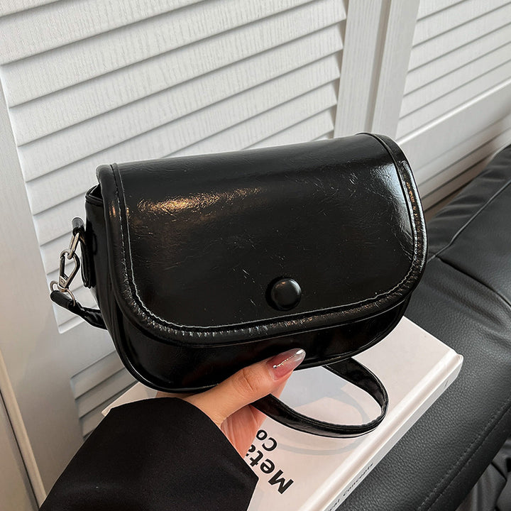 Damen Umhängetasche mit eleganter Klappöffnung und verstellbarem Schultergurt Nord Taschen