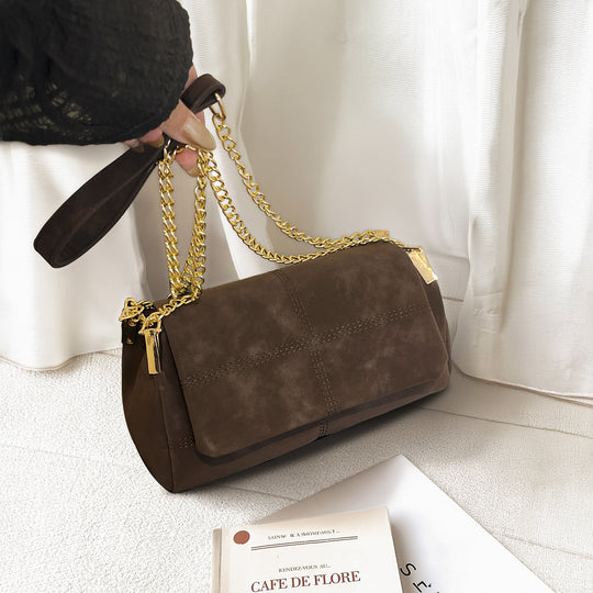 Damen elegante Umhängetasche aus hochwertigem Wildleder mit goldenen Kettenakzenten Nord Taschen