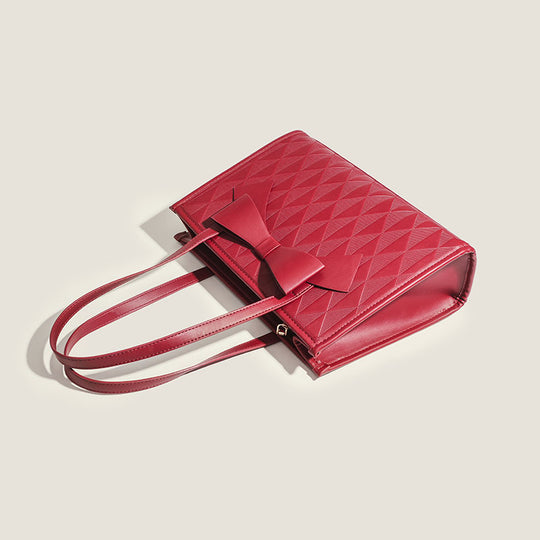 Damen Handtasche mit eleganter Diamantsteppung und dekorativem Schleifenakzent Nord Taschen