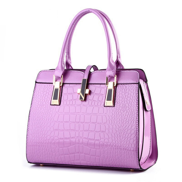 Damen Handtasche mit luxuriösem Krokodilleder-Look und goldenen Akzenten Nord Taschen