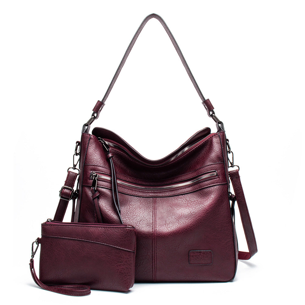 Damen Hobo-Tasche mit abnehmbarem Kosmetiktäschchen und eleganten Reißverschlussfächern Nord Taschen