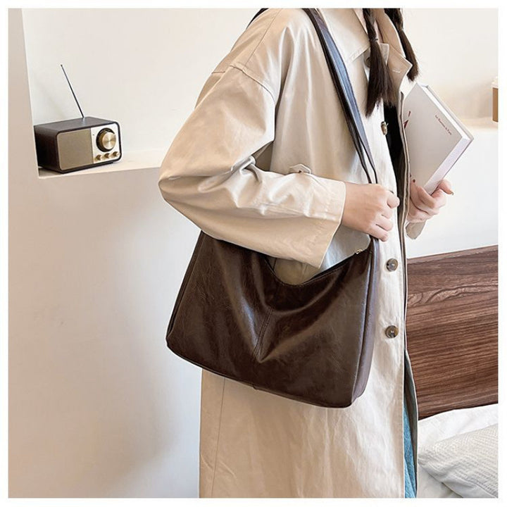Damen Hobo-Handtasche mit weichem Kunstleder und elegantem Tragegurt Nord Taschen