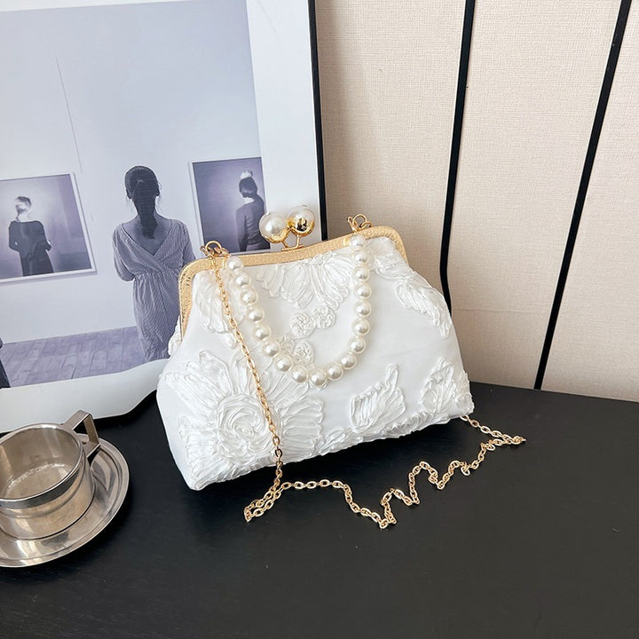 Damen elegante Clutch mit floralen Stickereien und Perlenakzenten Nord Taschen