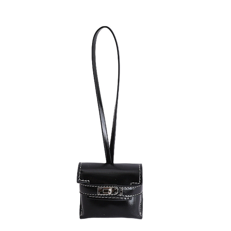 Damen Mini-Handtasche aus hochwertigem Kunstleder mit verspieltem Verschluss Nord Taschen