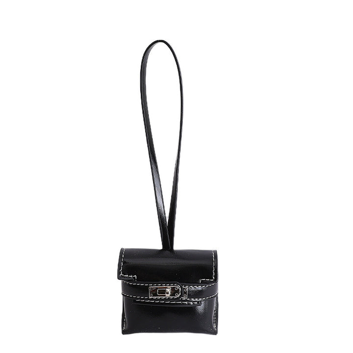 Damen Mini-Handtasche aus hochwertigem Kunstleder mit verspieltem Verschluss Nord Taschen