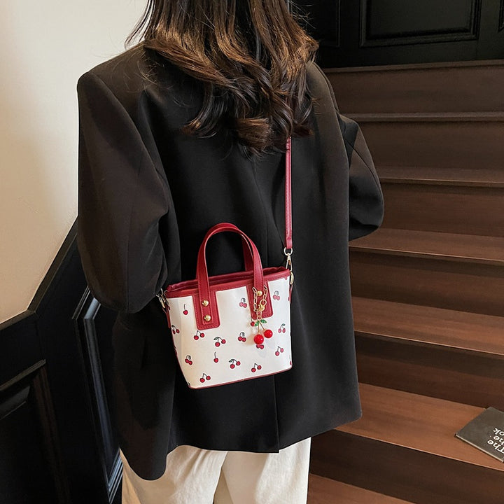 Damen kleine Handtasche mit verspieltem Kirschmotiv Nord Taschen