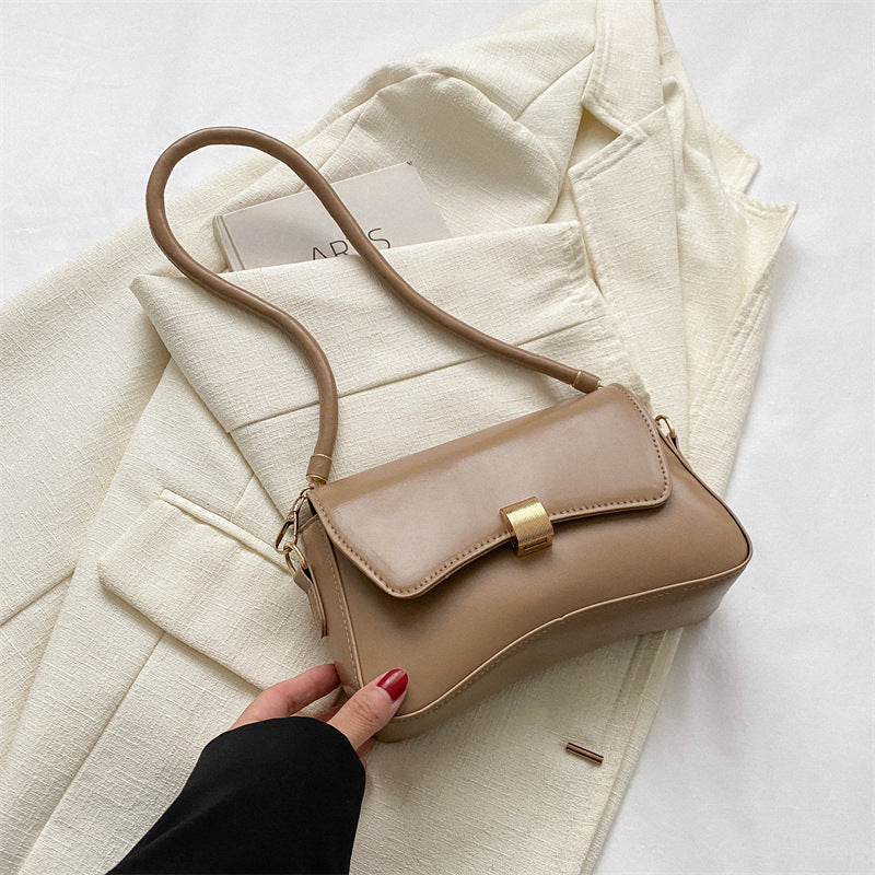 Damen elegante Umhängetasche mit goldener Verschlussmechanik Nord Taschen