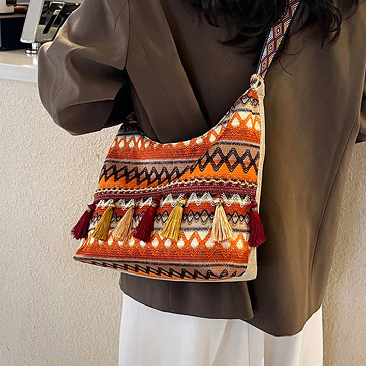 Damen Umhängetasche mit kunstvollem Ethnodesign und lebhaften Quasten Nord Taschen