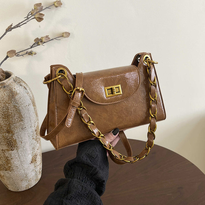 Damen elegante Handtasche mit dekorativem Kettenhenkel Nord Taschen