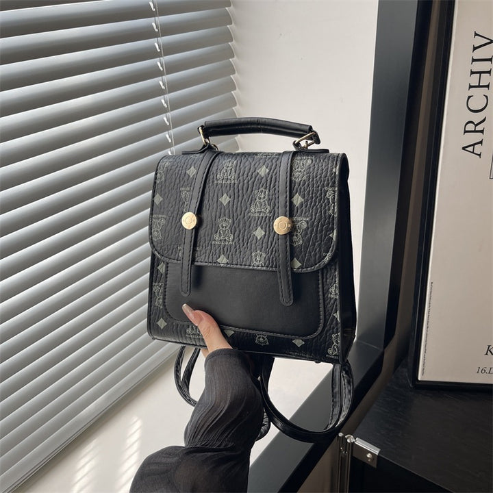 Damen Rucksackhandtasche mit verspieltem Anhänger Nord Taschen