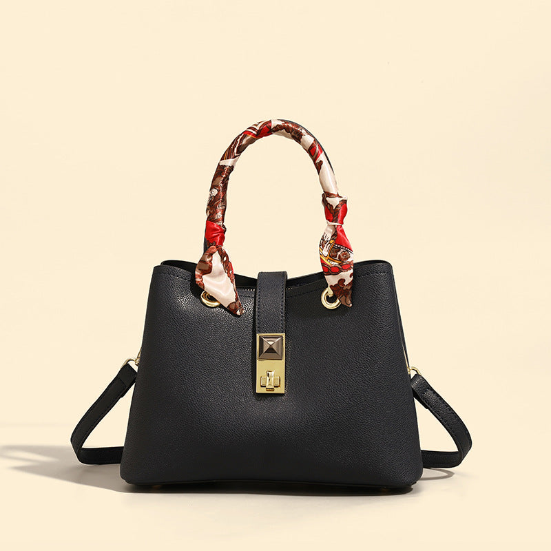 Damen Handtasche mit verspieltem Halstuch-Detail und elegantem Leder Nord Taschen