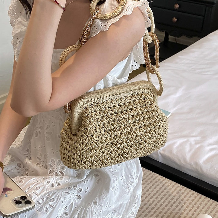 Damen-Handtasche aus geflochtenem Material mit dekorativen Griffen Nord Taschen