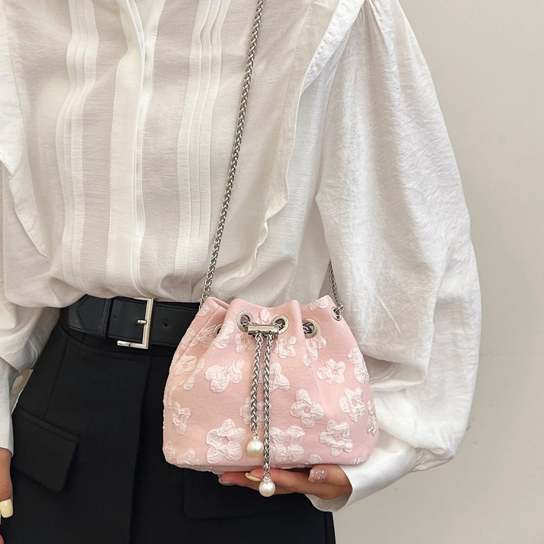 Damen Beuteltasche mit floralem Reliefdesign Nord Taschen