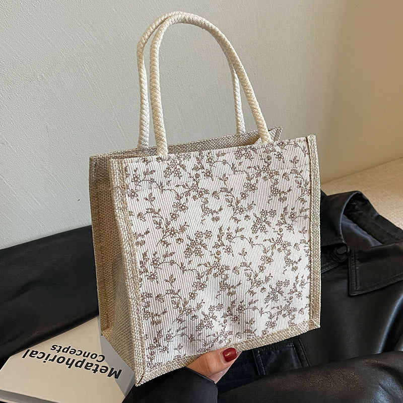 Damen Handtasche mit floralem Design und robusten Griffen Nord Taschen