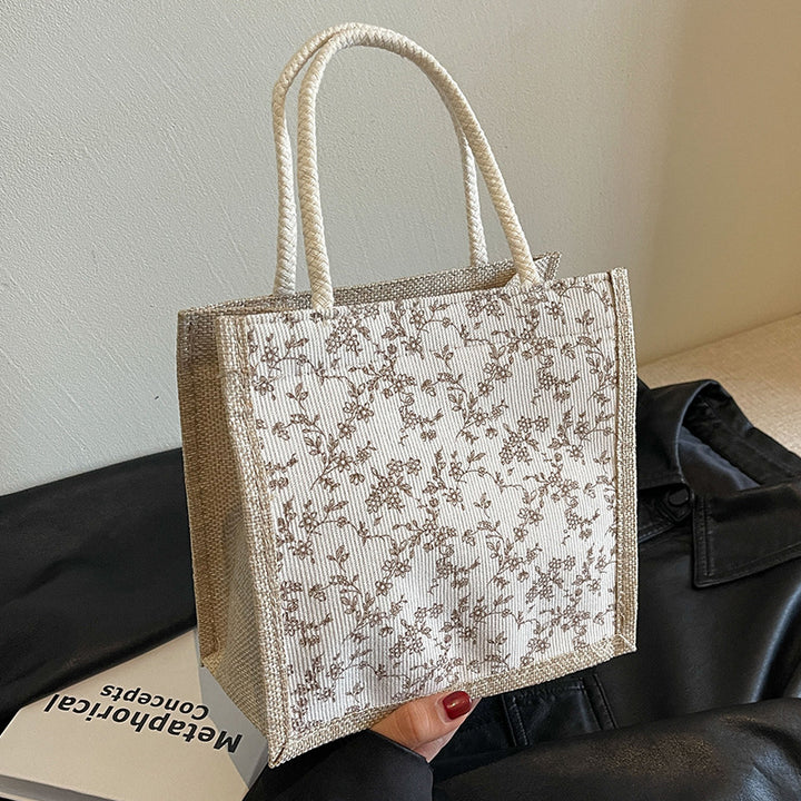 Damen Handtasche mit floralem Design und robusten Griffen Nord Taschen