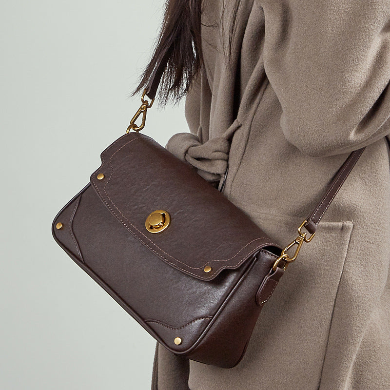 Damen Umhängetasche aus hochwertigem Kunstleder mit eleganter Klappenöffnung Nord Taschen